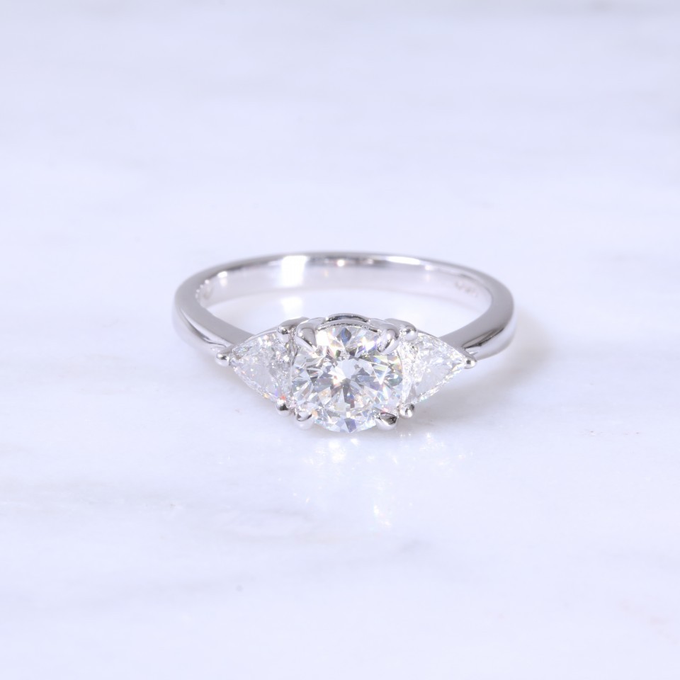 Round Brilliant & Trilliant Diamond Ring