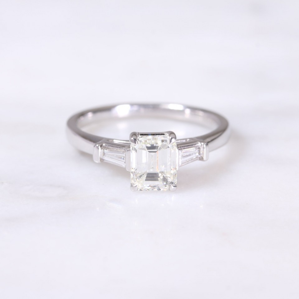 Emerald & Tapered Baguette Cut Diamond Ring