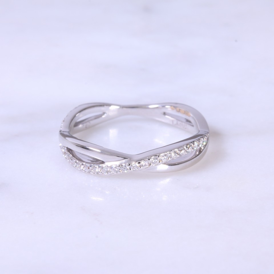 Intertwined diamond set eternity ring