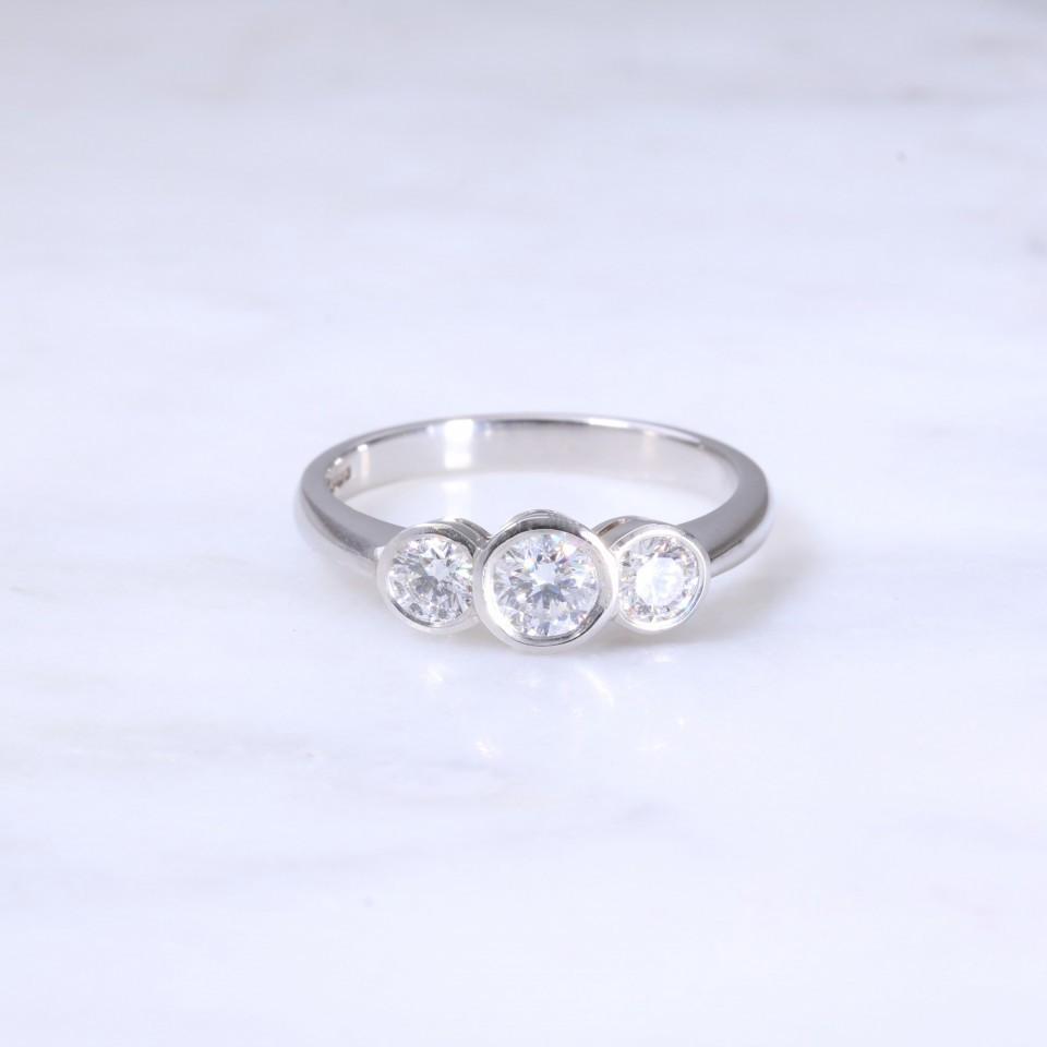 Lanes Round Brilliant Diamond  Rub-Over Set 3 Stone Ring