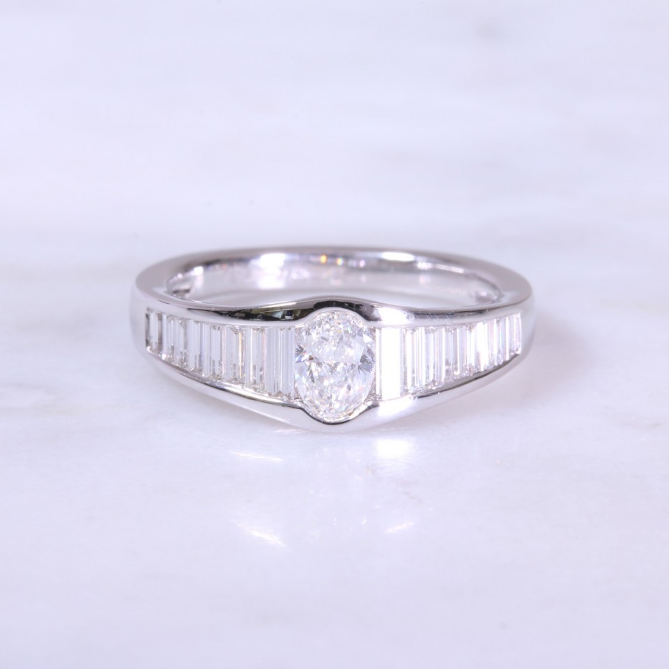 Oval and Baguette Diamond Channel Set Ring