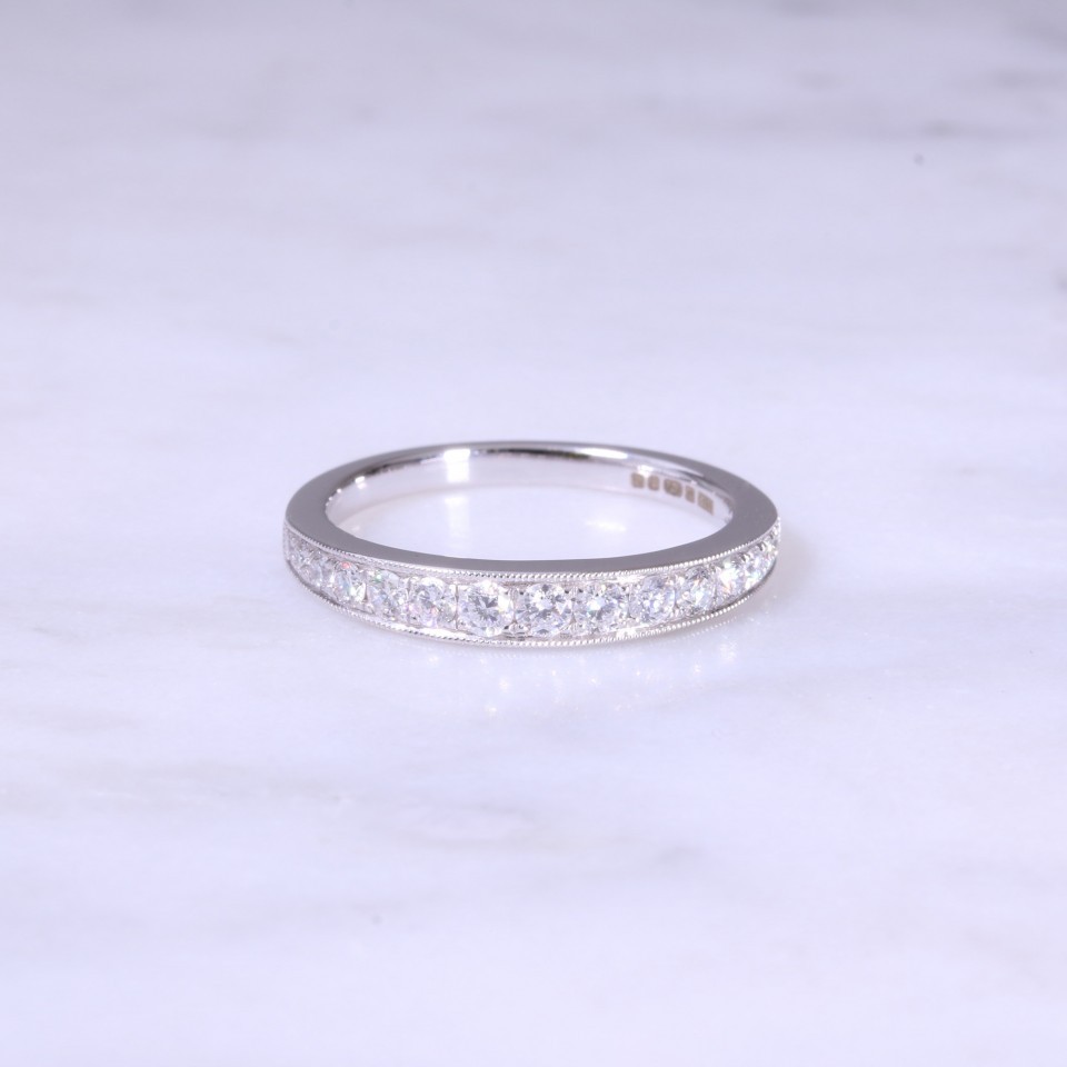 Graduated Grain Set Diamond 1/2 Eternity Ring