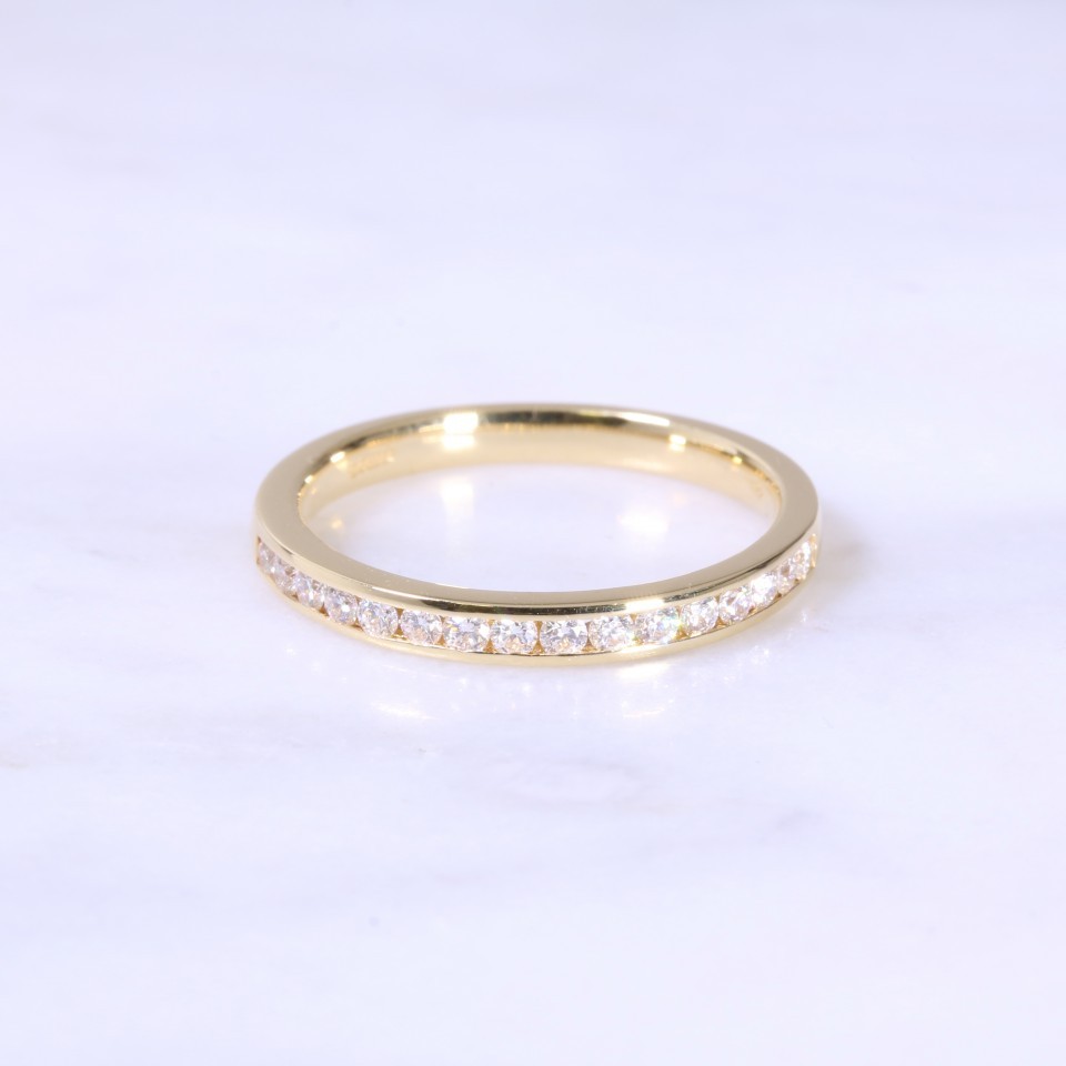 Fine Channel Set Half Eternity Ring