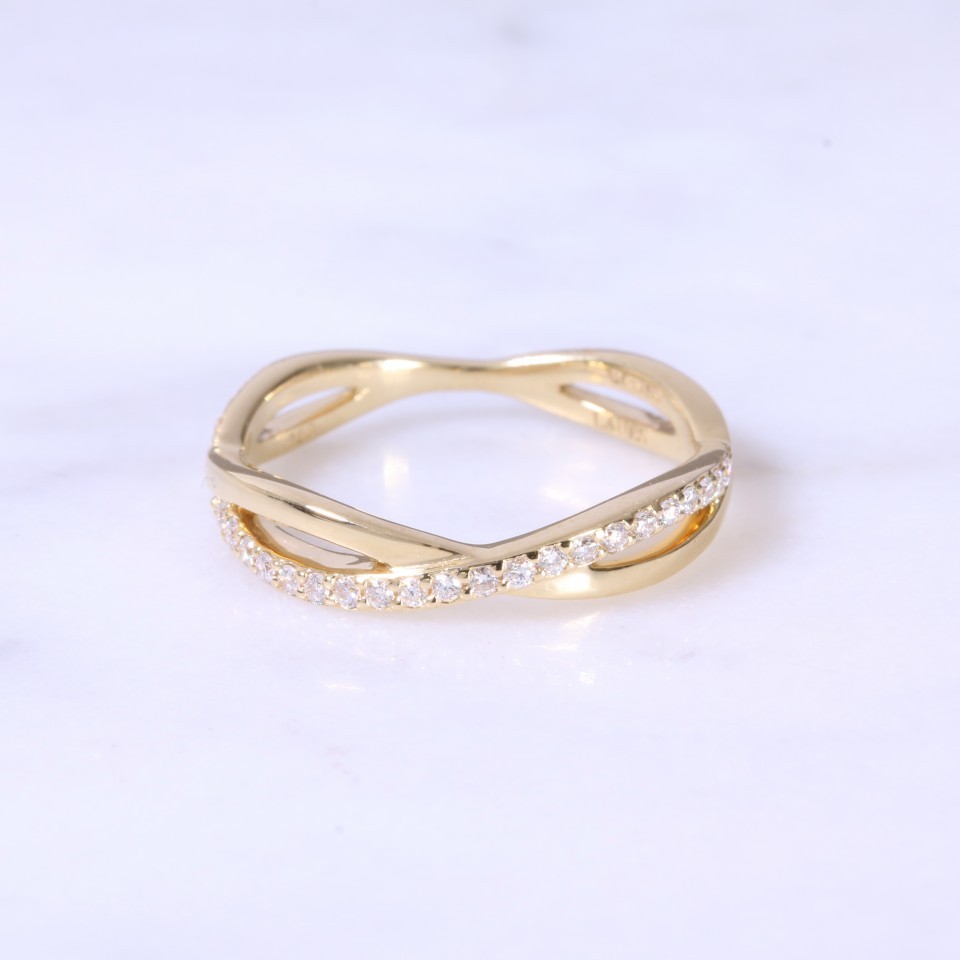 Intertwined diamond set eternity ring