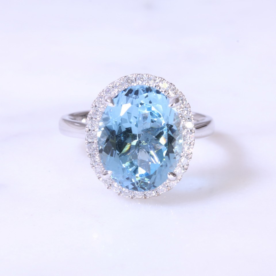 Oval Aquamarine & Diamond Halo ring