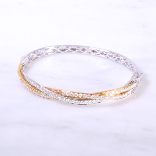 Diamond set intertwined gold bangle