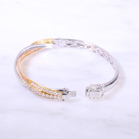 Diamond set intertwined gold bangle