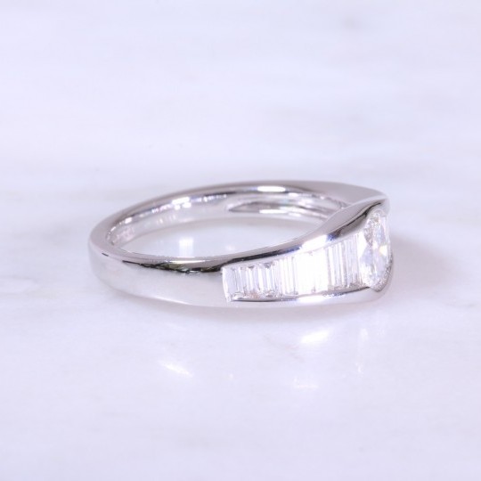 Oval and Baguette Diamond Channel Set Ring