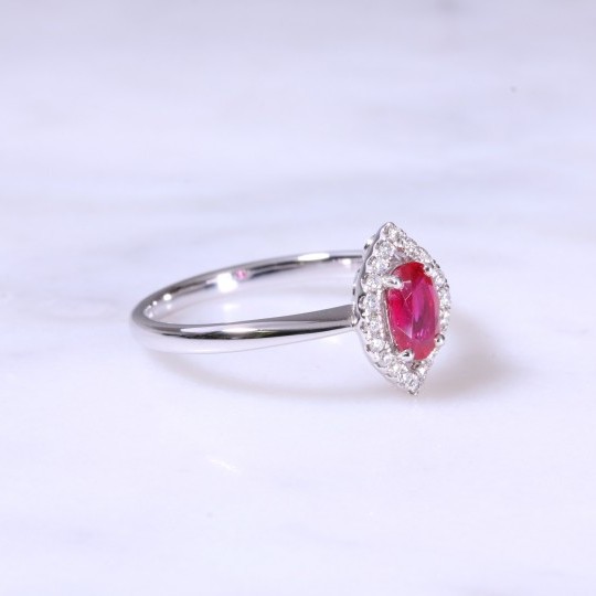 Oval Ruby & Halo Diamond Cluster Ring
